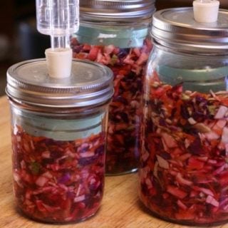 Lacto-fermented sauerkraut has so many great things going for it - beneficial enzymes, lots of vitamin C and natural probiotics that aid in digestion and general heath. And this rainbow version is even better.