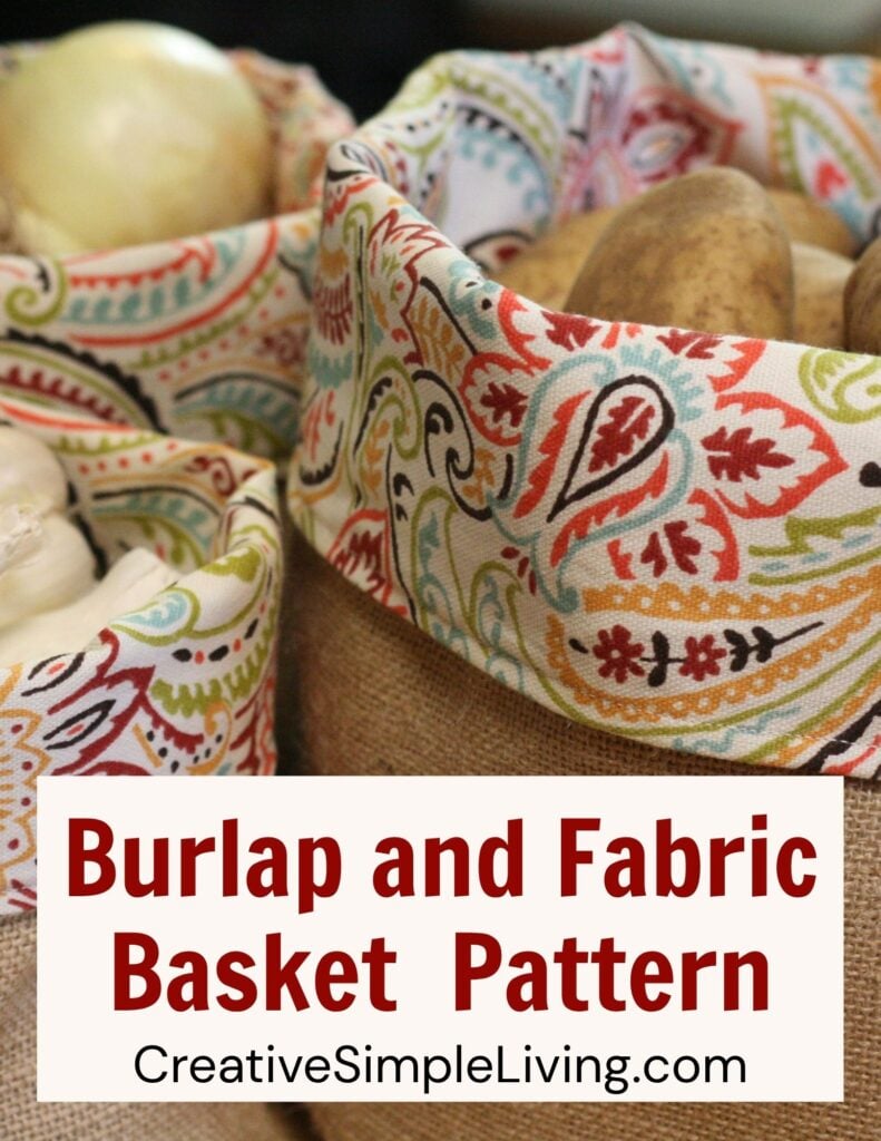 Close-up of colorful fabric-lined burlap produce baskets holding potatoes, onions, and garlic. Text on the image reads: “Burlap and Fabric Basket Pattern, CreativeSimpleLiving.com.”.