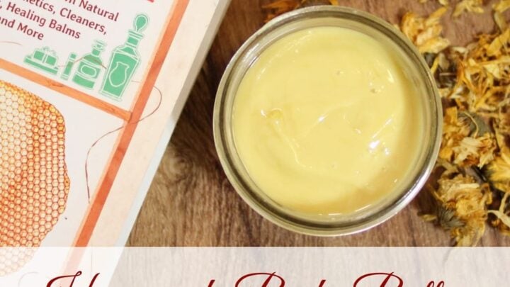an overhead view of a mason jar with body butter