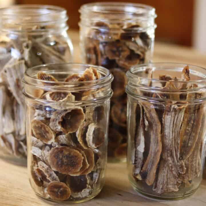 open mason jars with dried banana chips and banana jerky