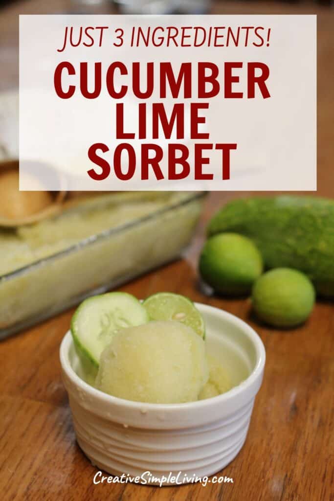 Small white bowl with refreshing cucumber lime sorbet, garnished with crisp lime and cucumber slices. In the background are whole limes, a cucumber, and a dish of sorbet. Text above reads “Cucumber Lime Sorbet, Just 3 Ingredients!”.