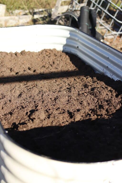 How to fill a raised garden bed (and save money) - Creative Simple Living
